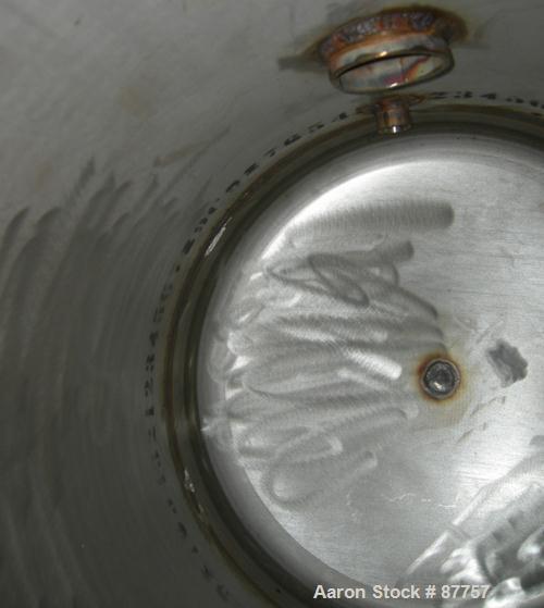 Unused- Mueller Pressure Tank, 250 gallon, 304/304L stainless steel, horizontal. 24" diameter x 124" straight side. (1) End dished, (1) end is a 24" bolt-on flat manway with davit arm. Internal rated...
