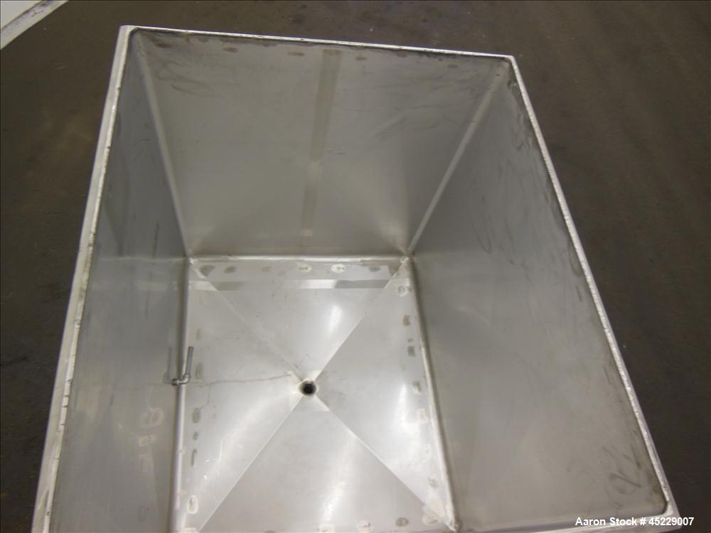 Used Mueller Porta Tank, Approximate 450 Gallon, 316 Stainless Steel. 51" long x 44" wide x 48" straight side, open top, no cover, slight coned bottom. Approximate 2" bottom outlet. Mounted on caster...