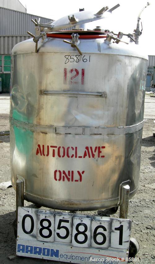 USED: Mueller tank, 300 gallon, 304 stainless steel, vertical. 44" diameter x 42" straight side, dished top and bottom. 1" diameter bottom supported shaft with (2) 3 blade turbines (no drive). 2 Side...