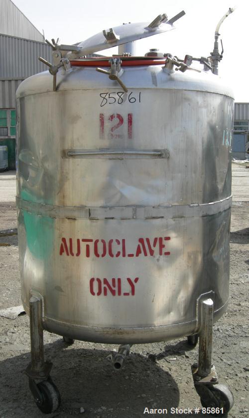 USED: Mueller tank, 300 gallon, 304 stainless steel, vertical. 44" diameter x 42" straight side, dished top and bottom. 1" diameter bottom supported shaft with (2) 3 blade turbines (no drive). 2 Side...