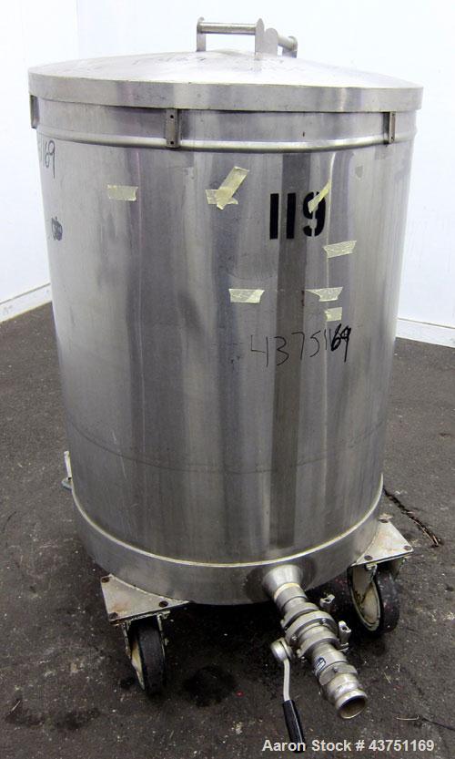Used Tank, 100 Gallon, 304 Stainless Steel, Vertical. Approximate 31" diameter x 38" straight side. Open top with a 1 piece cover, 1" sloped bottom. 2-1/4" Side bottom outlet. Skirt mounted with cast...