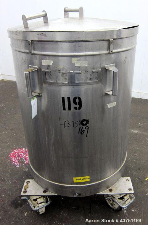 Used Tank, 100 Gallon, 304 Stainless Steel, Vertical. Approximate 31" diameter x 38" straight side. Open top with a 1 piece cover, 1" sloped bottom. 2-1/4" Side bottom outlet. Skirt mounted with cast...