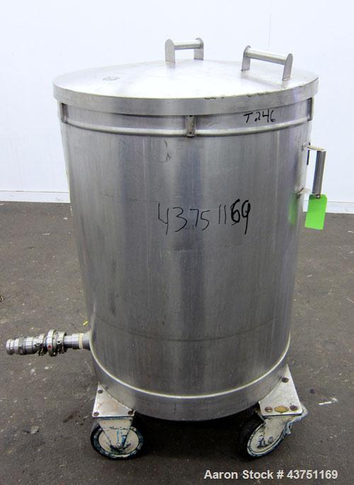 Used Tank, 100 Gallon, 304 Stainless Steel, Vertical. Approximate 31" diameter x 38" straight side. Open top with a 1 piece cover, 1" sloped bottom. 2-1/4" Side bottom outlet. Skirt mounted with cast...