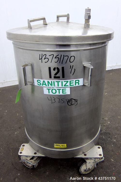 Used Tank, 100 Gallon, 304 Stainless Steel, Vertical. Approximate 31" diameter x 38" straight side. Open top with a 1 piece cover, 1" sloped bottom. 2-1/4" Side bottom outlet. Skirt mounted with cast...