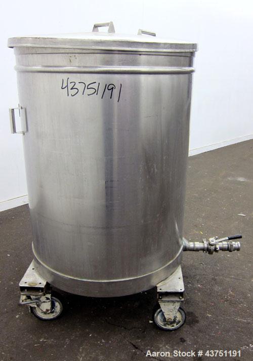 Used Tank, 200 Gallon, 304 Stainless Steel, Vertical.  Approximately 38" diameter x 47" straight side.  Open top with a 1 piece cover, 1/2" sloped bottom. 2-1/4" Side bottom outlet.  Skirt mounted wi...