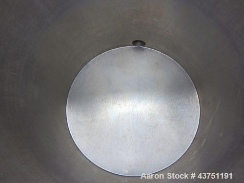 Used Tank, 200 Gallon, 304 Stainless Steel, Vertical.  Approximately 38" diameter x 47" straight side.  Open top with a 1 piece cover, 1/2" sloped bottom. 2-1/4" Side bottom outlet.  Skirt mounted wi...