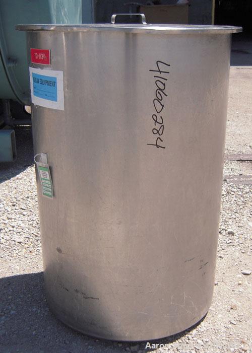 Used Tank/Drum, 70 Gallon, 316 Stainless Steel, Vertical. 24" diameter x 36" deep, flat open top with a cover, flat bottom. 1 1/2" tri-clamp side bottom outlet.