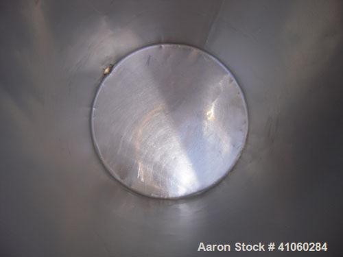 Used Tank/Drum, 70 Gallon, 316 Stainless Steel, Vertical. 24" diameter x 36" deep, flat open top with a cover, flat bottom. 1 1/2" tri-clamp side bottom outlet.
