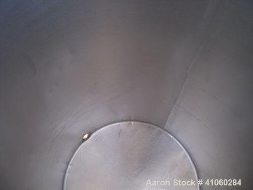 Used Tank/Drum, 70 Gallon, 316 Stainless Steel, Vertical. 24" diameter x 36" deep, flat open top with a cover, flat bottom. 1 1/2" tri-clamp side bottom outlet.