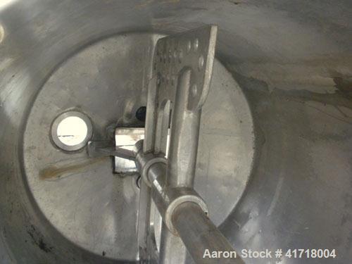 Used Tank, 125 Gallon, 316 Stainless Steel, Vertical. 30" Diameter x 39" straight side. Open top with a fixed stainless steel agitator bridge, dish bottom. 2-1/2" Diameter shaft with bottom supported...