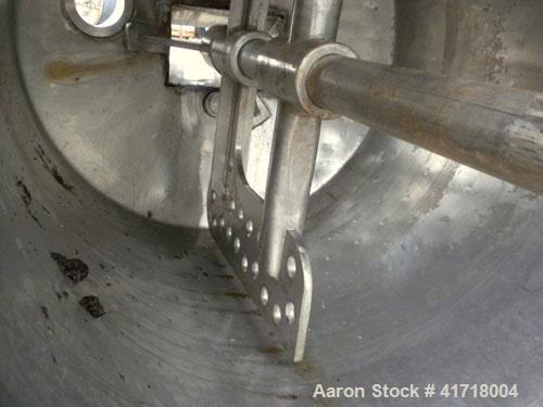 Used Tank, 125 Gallon, 316 Stainless Steel, Vertical. 30" Diameter x 39" straight side. Open top with a fixed stainless steel agitator bridge, dish bottom. 2-1/2" Diameter shaft with bottom supported...