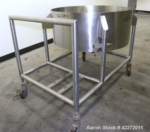 Used Tank, Approximate 40 Gallon, 316 stainless steel, vertical. 32" diameter x 12" straight side. Open top, no cover, coned bottom. 2" Tri-clamp center bottom outlet. Mounted on a stainless steel fr...