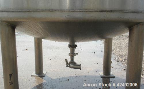 Used Tank, 440 Gallon, 304 Stainless Steel, Vertical. 48" Diameter x 52" straight side. Open top with a 2 piece cover, 1/2 bolt on, 1/2 clamp, dished bottom. Off center top entering Lightnin agitator...