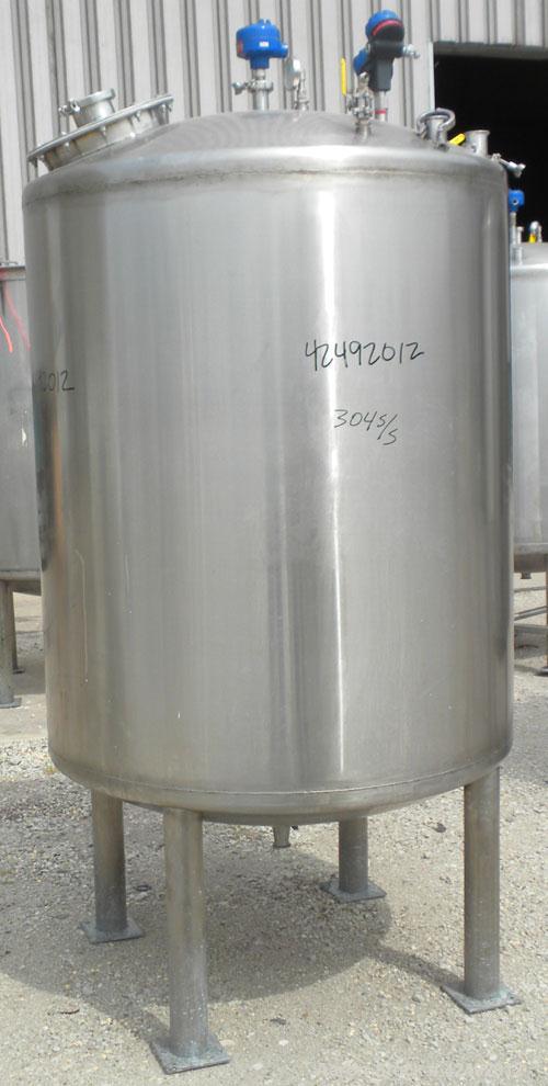 Used Tank, 440 Gallon, 304 Stainless Steel, Vertical. 48" Diameter x 52" straight side, dished top and bottom. Openings: top 1-1/2" tri-clamp, (5) 2" tri-clamp, 12" manway with a 4" tri-clamp in the ...