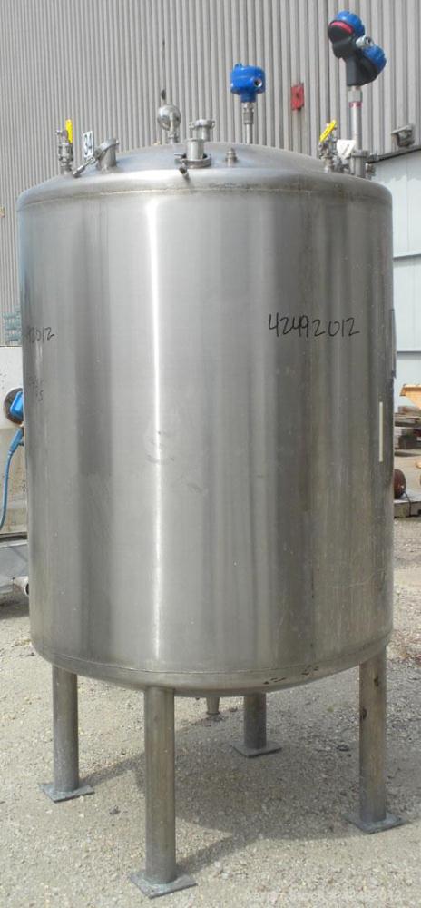 Used Tank, 440 Gallon, 304 Stainless Steel, Vertical. 48" Diameter x 52" straight side, dished top and bottom. Openings: top 1-1/2" tri-clamp, (5) 2" tri-clamp, 12" manway with a 4" tri-clamp in the ...