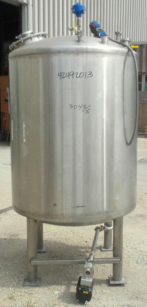 Used Tank, 440 Gallon, 304 Stainless Steel, Vertical. 48" Diameter x 52" straight side, dished top and bottom. Openings: top 1-1/2" tri-clamp, (5) 2" tri-clamp, 12" manway with a 4" tri-clamp in the ...