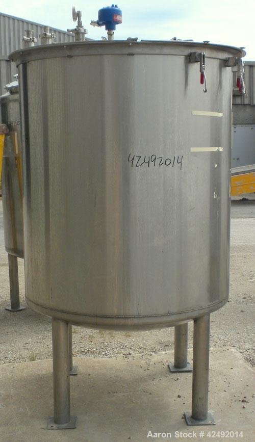 Used Tank, 440 Gallon, 304 Stainless Steel, Vertical. 48" Diameter x 52" straight side. Open top with a 2 piece cover, 1/2 bolt on, 1/2 clamp, dished bottom. Openings: top (6) 2" tri-clamp, 4" sightg...