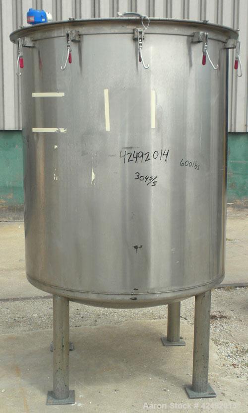 Used Tank, 440 Gallon, 304 Stainless Steel, Vertical. 48" Diameter x 52" straight side. Open top with a 2 piece cover, 1/2 bolt on, 1/2 clamp, dished bottom. Openings: top (6) 2" tri-clamp, 4" sightg...