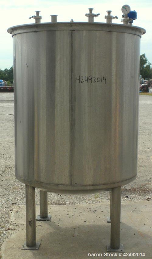 Used Tank, 440 Gallon, 304 Stainless Steel, Vertical. 48" Diameter x 52" straight side. Open top with a 2 piece cover, 1/2 bolt on, 1/2 clamp, dished bottom. Openings: top (6) 2" tri-clamp, 4" sightg...