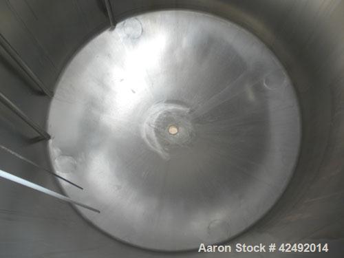 Used Tank, 440 Gallon, 304 Stainless Steel, Vertical. 48" Diameter x 52" straight side. Open top with a 2 piece cover, 1/2 bolt on, 1/2 clamp, dished bottom. Openings: top (6) 2" tri-clamp, 4" sightg...