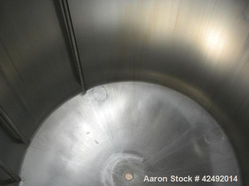 Used Tank, 440 Gallon, 304 Stainless Steel, Vertical. 48" Diameter x 52" straight side. Open top with a 2 piece cover, 1/2 bolt on, 1/2 clamp, dished bottom. Openings: top (6) 2" tri-clamp, 4" sightg...
