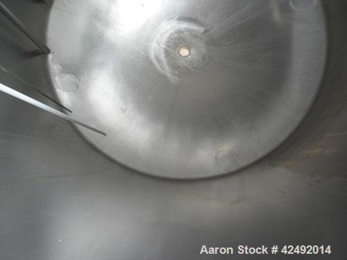Used Tank, 440 Gallon, 304 Stainless Steel, Vertical. 48" Diameter x 52" straight side. Open top with a 2 piece cover, 1/2 bolt on, 1/2 clamp, dished bottom. Openings: top (6) 2" tri-clamp, 4" sightg...