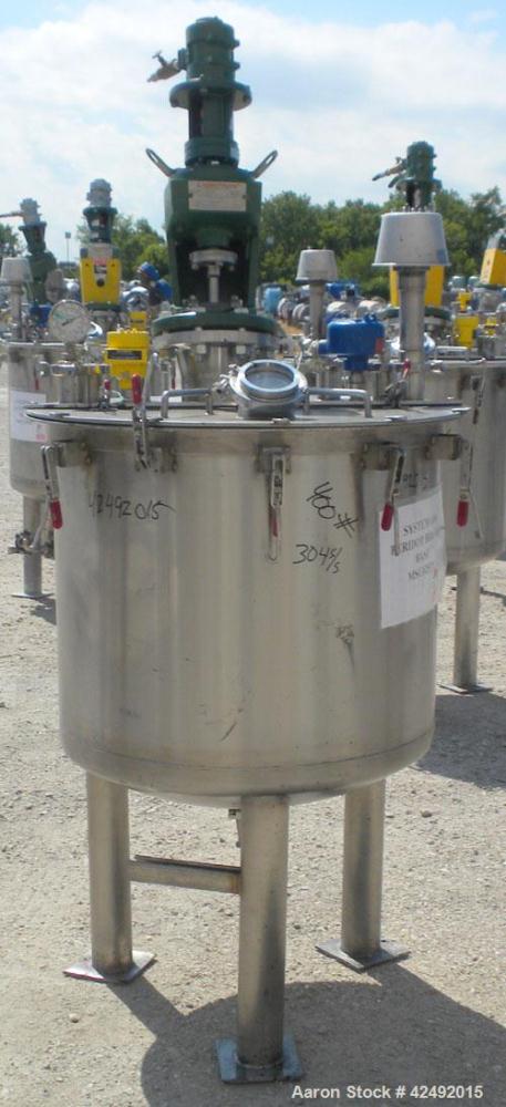 Used Tank, 80 Gallon, 304 Stainless Steel, Vertical. 30" Diameter x 24" straight side. Open top with a 2 piece cover, 1/2 bolt on, 1/2 clamp, dished bottom. Off center top entering Lightnin air opera...