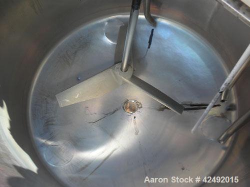 Used Tank, 80 Gallon, 304 Stainless Steel, Vertical. 30" Diameter x 24" straight side. Open top with a 2 piece cover, 1/2 bolt on, 1/2 clamp, dished bottom. Off center top entering Lightnin air opera...