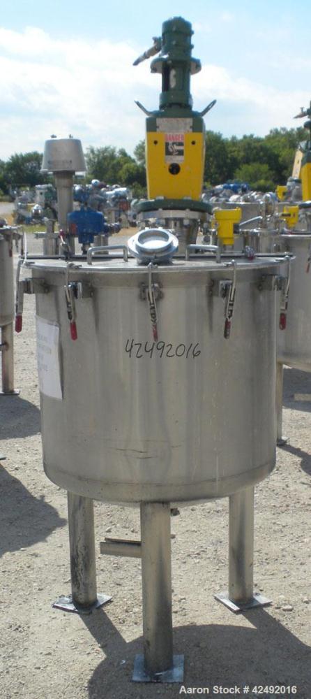 Used Tank, 80 Gallon, 304 Stainless Steel, Vertical. 30" Diameter x 24" straight side. Open top with a 2 piece cover, 1/2 bolt on, 1/2 clamp, dished bottom. Off center top entering Lightnin air opera...