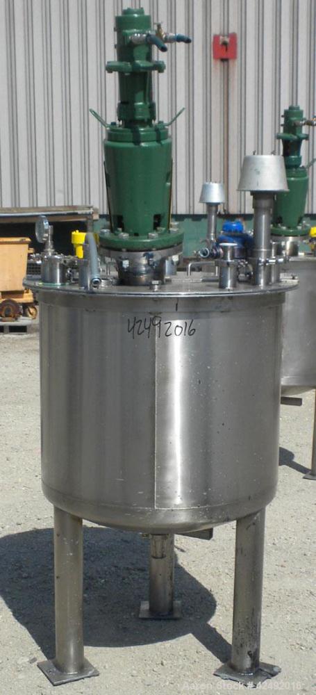 Used Tank, 80 Gallon, 304 Stainless Steel, Vertical. 30" Diameter x 24" straight side. Open top with a 2 piece cover, 1/2 bolt on, 1/2 clamp, dished bottom. Off center top entering Lightnin air opera...