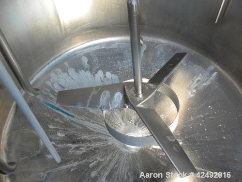 Used Tank, 80 Gallon, 304 Stainless Steel, Vertical. 30" Diameter x 24" straight side. Open top with a 2 piece cover, 1/2 bolt on, 1/2 clamp, dished bottom. Off center top entering Lightnin air opera...