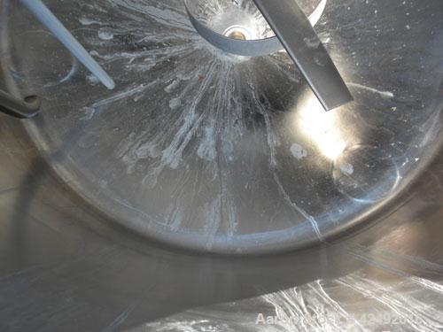 Used Tank, 80 Gallon, 304 Stainless Steel, Vertical. 30" Diameter x 24" straight side. Open top with a 2 piece cover, 1/2 bolt on, 1/2 clamp, dished bottom. Off center top entering Lightnin air opera...