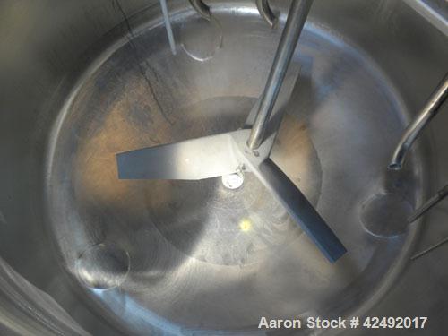 Used Tank, 80 Gallon, 304 Stainless Steel, Vertical. 30" Diameter x 24" straight side. Open top with a 2 piece cover, 1/2 bolt on, 1/2 clamp, dished bottom. Off center top entering Lightnin air opera...