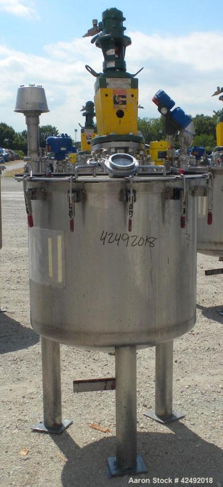 Used Tank, 80 Gallon, 304 Stainless Steel, Vertical. 30" Diameter x 24" straight side. Open top with a 2 piece cover, 1/2 bolt on, 1/2 clamp, dished bottom. Off center top entering Lightnin air opera...