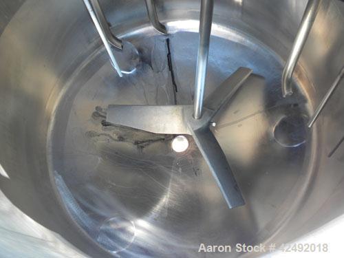 Used Tank, 80 Gallon, 304 Stainless Steel, Vertical. 30" Diameter x 24" straight side. Open top with a 2 piece cover, 1/2 bolt on, 1/2 clamp, dished bottom. Off center top entering Lightnin air opera...