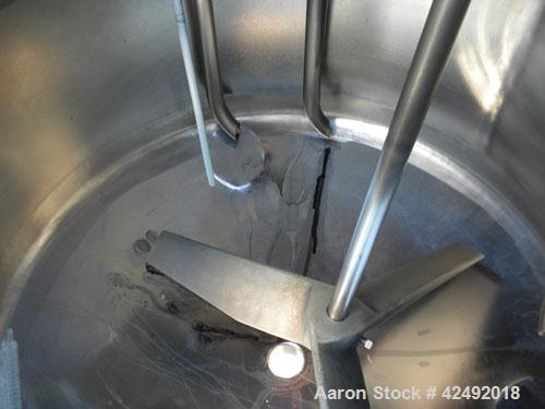 Used Tank, 80 Gallon, 304 Stainless Steel, Vertical. 30" Diameter x 24" straight side. Open top with a 2 piece cover, 1/2 bolt on, 1/2 clamp, dished bottom. Off center top entering Lightnin air opera...