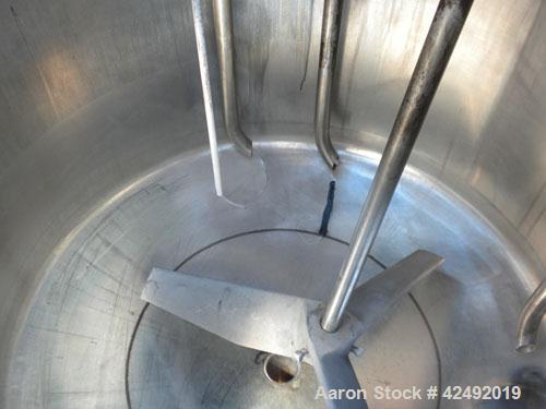 Used Tank, 80 Gallon, 304 Stainless Steel, Vertical. 30" Diameter x 24" straight side. Open top with a 2 piece cover, 1/2 bolt on, 1/2 clamp, dished bottom. Off center top entering Lightnin air opera...