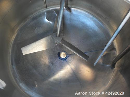Used Tank, 80 Gallon, 304 Stainless Steel, Vertical. 30" Diameter x 24" straight side. Open top with a 2 piece cover, 1/2 bolt on, 1/2 clamp, dished bottom. Off center top entering Lightnin air opera...