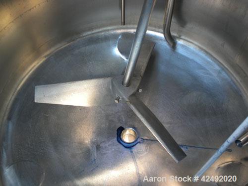 Used Tank, 80 Gallon, 304 Stainless Steel, Vertical. 30" Diameter x 24" straight side. Open top with a 2 piece cover, 1/2 bolt on, 1/2 clamp, dished bottom. Off center top entering Lightnin air opera...
