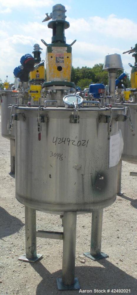 Used Tank, 80 Gallon, 304 Stainless Steel, Vertical. 30" Diameter x 24" straight side. Open top with a 2 piece cover, 1/2 bolt on, 1/2 clamp, dished bottom. Off center top entering Lightnin air opera...