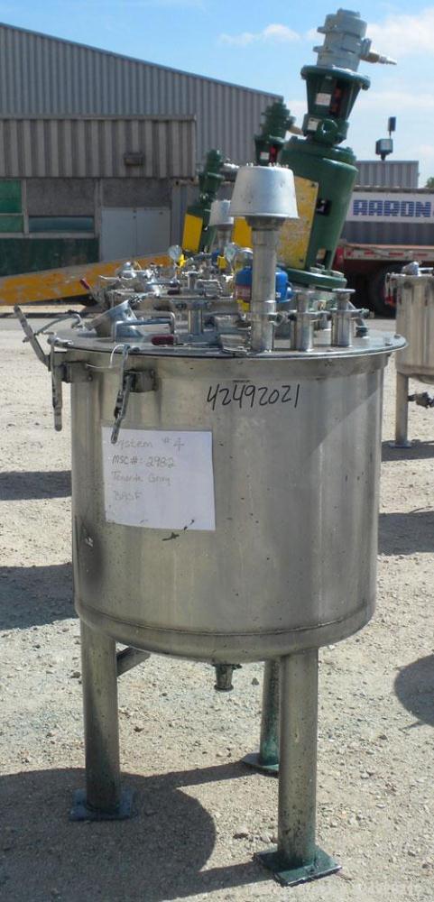 Used Tank, 80 Gallon, 304 Stainless Steel, Vertical. 30" Diameter x 24" straight side. Open top with a 2 piece cover, 1/2 bolt on, 1/2 clamp, dished bottom. Off center top entering Lightnin air opera...