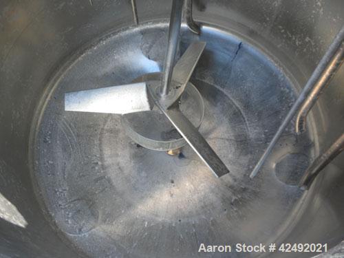 Used Tank, 80 Gallon, 304 Stainless Steel, Vertical. 30" Diameter x 24" straight side. Open top with a 2 piece cover, 1/2 bolt on, 1/2 clamp, dished bottom. Off center top entering Lightnin air opera...
