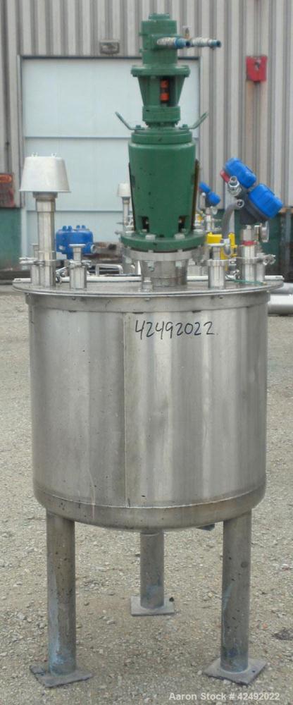 Used Tank, 80 Gallon, 304 Stainless Steel, Vertical. 30" Diameter x 24" straight side. Open top with a 2 piece cover, 1/2 bolt on, 1/2 clamp, dished bottom. Off center top entering Lightnin air opera...