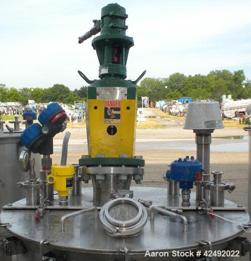 Used Tank, 80 Gallon, 304 Stainless Steel, Vertical. 30" Diameter x 24" straight side. Open top with a 2 piece cover, 1/2 bolt on, 1/2 clamp, dished bottom. Off center top entering Lightnin air opera...