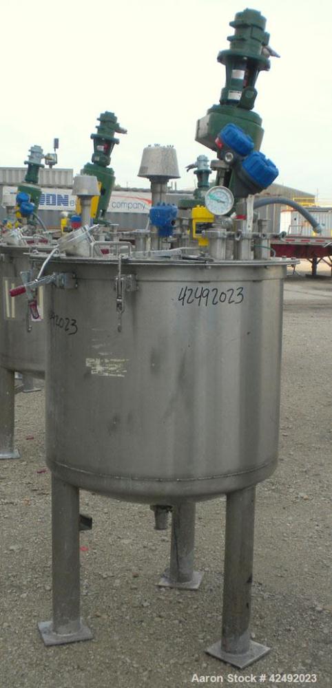 Used Tank, 80 Gallon, 304 Stainless Steel, Vertical. 30" Diameter x 24" straight side. Open top with a 2 piece cover, 1/2 bolt on, 1/2 clamp, dished bottom. Off center top entering Lightnin air opera...