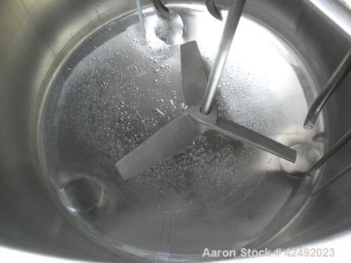 Used Tank, 80 Gallon, 304 Stainless Steel, Vertical. 30" Diameter x 24" straight side. Open top with a 2 piece cover, 1/2 bolt on, 1/2 clamp, dished bottom. Off center top entering Lightnin air opera...
