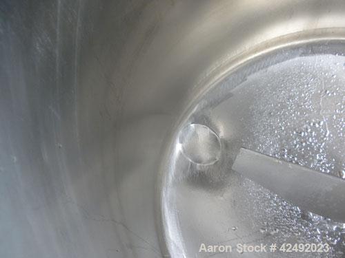 Used Tank, 80 Gallon, 304 Stainless Steel, Vertical. 30" Diameter x 24" straight side. Open top with a 2 piece cover, 1/2 bolt on, 1/2 clamp, dished bottom. Off center top entering Lightnin air opera...