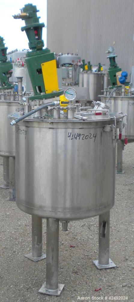 Used Tank, 80 Gallon, 304 Stainless Steel, Vertical. 30" Diameter x 24" straight side. Open top with a 2 piece cover, 1/2 bolt on, 1/2 clamp, dished bottom. Off center top entering Lightnin air opera...