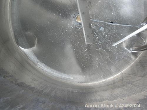 Used Tank, 80 Gallon, 304 Stainless Steel, Vertical. 30" Diameter x 24" straight side. Open top with a 2 piece cover, 1/2 bolt on, 1/2 clamp, dished bottom. Off center top entering Lightnin air opera...