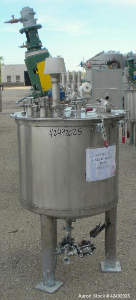 Used Tank, 80 Gallon, 304 Stainless Steel, Vertical. 30" Diameter x 24" straight side. Open top with a 2 piece cover, 1/2 bolt on, 1/2 clamp, dished bottom. Off center top entering Lightnin air opera...